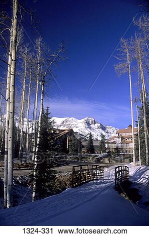 Pedestrian bridge covered with snow, Mountain Village, Telluride, Colorado, USA View Large Photo Image Stock Image - Pedestrian bridge covered with snow, Mountain Village, Telluride, Colorado, USA. Fotosearch