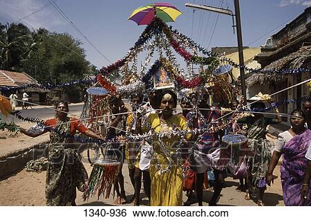 Penance in fulfilment of vows- piercing the body with sharp hooks and long needles, Mariamman Festival, Tamil Nadu, India View Large Photo Image Stock Photograph - Penance in fulfilment of vows- piercing the body with sharp hooks and long needles, Mariamman Festival, Tamil Nadu, India. Fotosearch