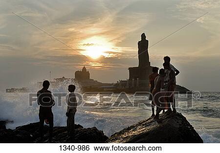 People standing on rocks with a temple in the background, Vivekananda Rock Memorial, Kanyakumari, Tamil Nadu, India View Large Photo Image Stock Photograph - People standing on rocks with a temple in the background, Vivekananda Rock Memorial, Kanyakumari, Tamil Nadu, India. Fotosearch