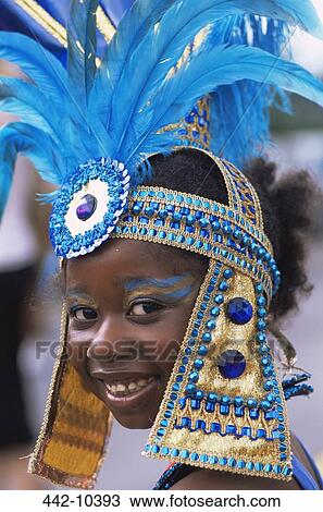 Portrait of a child performing in a carnival, Notting Hill Carnival, London, England View Large Photo Image Stock Image - Portrait of a child performing in a carnival, Notting Hill Carnival, London, England. Fotosearch