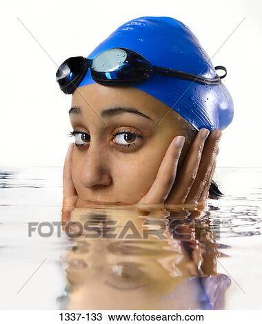 Portrait of a teenage girl in a swimming pool View Large Photo Image Stock Image - Portrait of a teenage girl in a swimming pool. Fotosearch