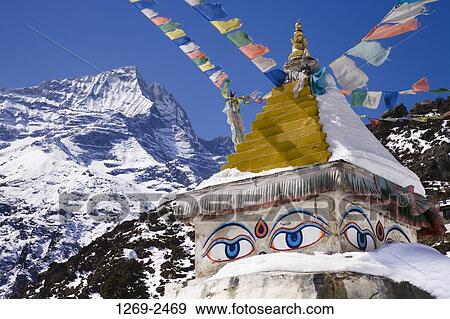 Prayer flags hanging over a pagoda, Namche Bazar, Kongde Ri, Sagarmatha National Park, Nepal View Large Photo Image Stock Photo - Prayer flags hanging over a pagoda, Namche Bazar, Kongde Ri, Sagarmatha National Park, Nepal. Fotosearch