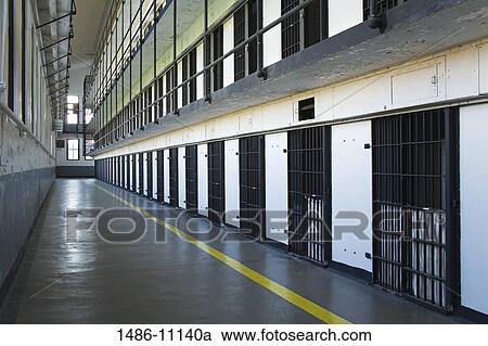 Stock Image - Prison cells in a museum, Old Montana Prison Museum, Deer Lodge, Montana, USA. Fotosearch