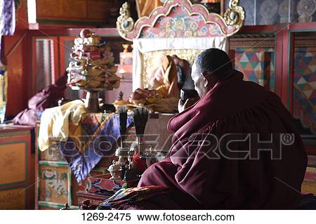 Rear view of a monk sitting in a monastery, Tengboche Monastery, Sagarmatha National Park, Nepal View Large Photo Image Stock Photography - Rear view of a monk sitting in a monastery, Tengboche Monastery, Sagarmatha National Park, Nepal. Fotosearch
