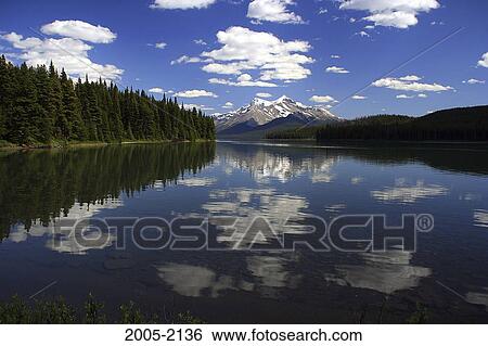 Reflection of clouds in water, Maligne Lake, Jasper National Park, Alberta, Canada View Large Photo Image Stock Photograph - Reflection of clouds in water, Maligne Lake, Jasper National Park, Alberta, Canada. Fotosearch