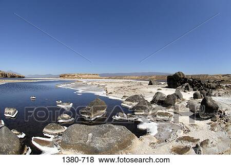 Rocks along the side of a salt lake, Lake Asal, Djibouti View Large Photo Image Stock Photo - Rocks along the side of a salt lake, Lake Asal, Djibouti. Fotosearch