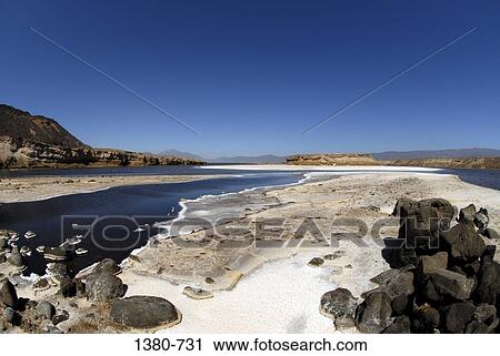 Rocks on the beach, Lake Asal, Djibouti View Large Photo Image Stock Image - Rocks on the beach, Lake Asal, Djibouti. Fotosearch
