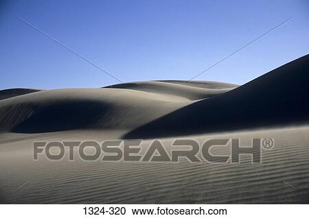 Sand dunes at a national park, Great Sand Dunes National Park, Colorado, USA View Large Photo Image Stock Image - Sand dunes at a national park, Great Sand Dunes National Park, Colorado, USA. Fotosearch