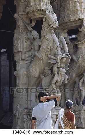 Sculptures carved on columns of a temple, Sesharaya Mandapam, Sri Ranganathaswamy Temple, Srirangam, Tamil Nadu, India View Large Photo Image Stock Photograph - Sculptures carved on columns of a temple, Sesharaya Mandapam, Sri Ranganathaswamy Temple, Srirangam, Tamil Nadu, India. Fotosearch