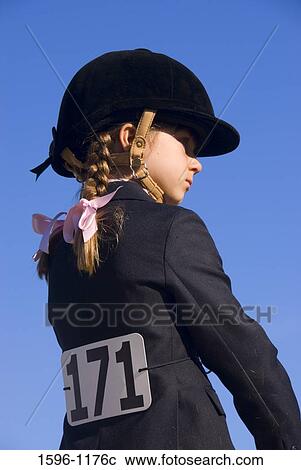 Side profile of a girl in equestrian clothing, Jefferson, Oregon, USA View Large Photo Image Stock Image - Side profile of a girl in equestrian clothing, Jefferson, Oregon, USA. Fotosearch