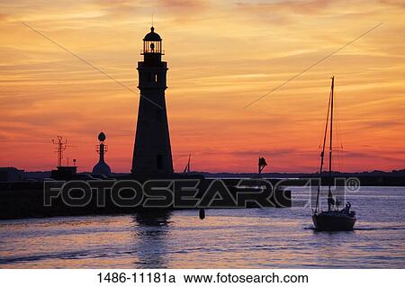 Silhouette of a lighthouse at dusk, Buffalo Lighthouse, Buffalo Port, New York State, USA View Large Photo Image Stock Image - Silhouette of a lighthouse at dusk, Buffalo Lighthouse, Buffalo Port, New York State, USA. Fotosearch