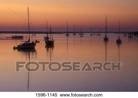 Silhouette of boats on a lake, Salt Run, Lighthouse Park, St. Augustine, Florida, USA View Large Photo Image Stock Photography - Silhouette of boats on a lake, Salt Run, Lighthouse Park, St. Augustine, Florida, USA. Fotosearch