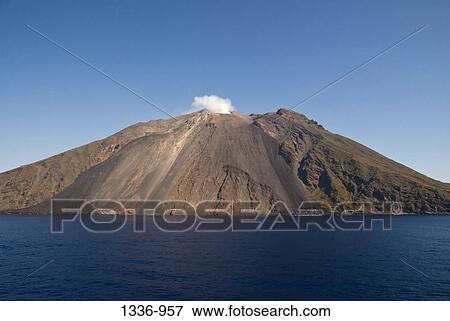 Smoke emerging from a volcano, Stromboli Volcano, Sicily, Italy View Large Photo Image Stock Photo - Smoke emerging from a volcano, Stromboli Volcano, Sicily, Italy. Fotosearch