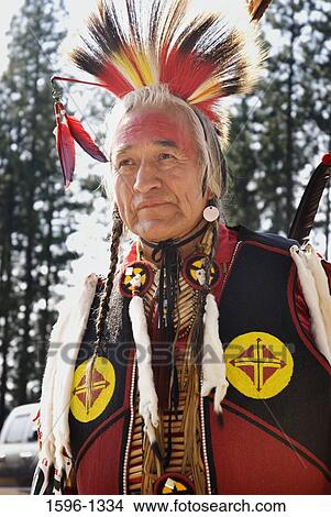 Spokane Indian man in traditional clothing at the tribal labor day ceremony, Pow Wow Spokane Indian Reservation, Wellpinit, Washington State, USA View Large Photo Image Picture - Spokane Indian man in traditional clothing at the tribal labor day ceremony, Pow Wow Spokane Indian Reservation, Wellpinit, Washington State, USA. Fotosearch
