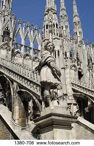 Statue in front of a church, Duomo, Milan, Lombardy, Italy View Large Photo Image Stock Photo - Statue in front of a church, Duomo, Milan, Lombardy, Italy. Fotosearch
