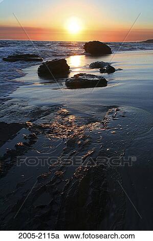 Sunset on the beach, Crystal Cove State Park, California, USA View Large Photo Image Stock Image - Sunset on the beach, Crystal Cove State Park, California, USA. Fotosearch