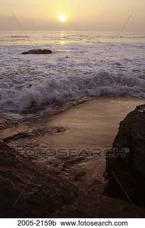 Sunset over the ocean, Crystal Cove State Park, California, USA View Large Photo Image Stock Image - Sunset over the ocean, Crystal Cove State Park, California, USA. Fotosearch