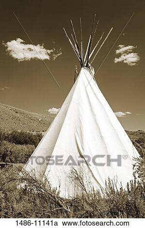 Stock Image - Teepee in a field, Bannack State Park, Dillon, Montana, USA. Fotosearch