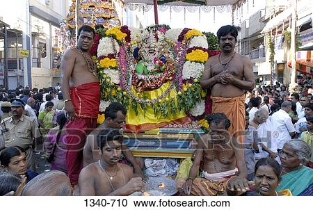 The Goddess on a procession along with priests during a festival in a temple, Kapaleeshwarar Temple, Mylapore, Chennai, Tamil Nadu, India View Large Photo Image Stock Image - The Goddess on a procession along with priests during a festival in a temple, Kapaleeshwarar Temple, Mylapore, Chennai, Tamil Nadu, India. Fotosearch