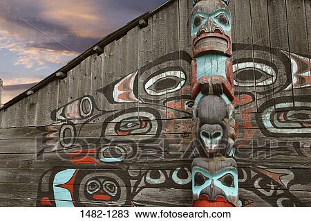 Totem pole near a building, Tlingit Tribal House, Totem Village, Haines, Alaska, USA View Large Photo Image Stock Image - Totem pole near a building, Tlingit Tribal House, Totem Village, Haines, Alaska, USA. Fotosearch