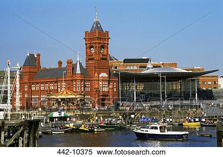 Tourboats moored near a clock tower, Cardiff Bay, Cardiff, Monmouthshire, Wales View Large Photo Image Stock Photography - Tourboats moored near a clock tower, Cardiff Bay, Cardiff, Monmouthshire, Wales. Fotosearch