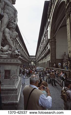 Tourist at a museum, Uffizi Gallery, Florence, Tuscany, Italy View Large Photo Image Stock Photo - Tourist at a museum, Uffizi Gallery, Florence, Tuscany, Italy. Fotosearch