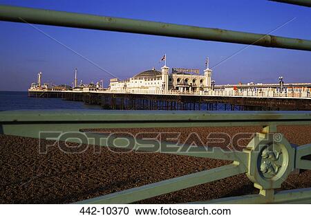 Tourist resort on a pier, Palace Pier, Brighton, Sussex, England View Large Photo Image Stock Image - Tourist resort on a pier, Palace Pier, Brighton, Sussex, England. Fotosearch
