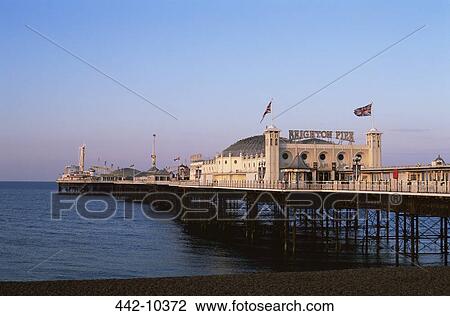 Tourist resort on a pier, Palace Pier, Brighton, Sussex, England View Large Photo Image Stock Image - Tourist resort on a pier, Palace Pier, Brighton, Sussex, England. Fotosearch