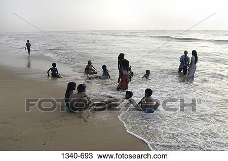 Tourists on the beach, Elliot's Beach, Besant Nagar, Chennai, Tamil Nadu, India View Large Photo Image Stock Image - Tourists on the beach, Elliot's Beach, Besant Nagar, Chennai, Tamil Nadu, India. Fotosearch