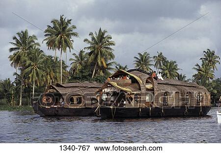 Two house boats in a lake, Alappuzha, Alappuzha District, Kerala, India View Large Photo Image Stock Photo - Two house boats in a lake, Alappuzha, Alappuzha District, Kerala, India. Fotosearch