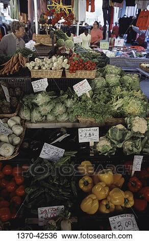 Vegetables in a vegetable market, Florence, Tuscany, Italy View Large Photo Image Stock Photograph - Vegetables in a vegetable market, Florence, Tuscany, Italy. Fotosearch