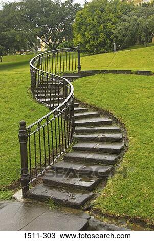 Winding steps and a wrought iron handrail on a hillside, Costa Rica View Large Photo Image Stock Image - Winding steps and a wrought iron handrail on a hillside, Costa Rica. Fotosearch