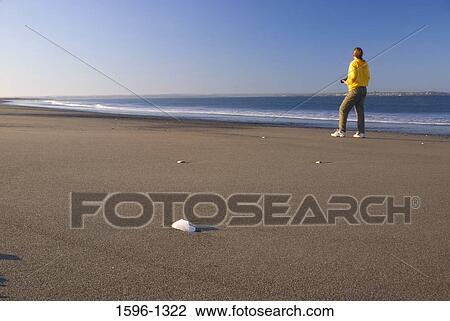 Woman standing on the beach, Damon Point State Park, Washington State, USA View Large Photo Image Stock Image - Woman standing on the beach, Damon Point State Park, Washington State, USA. Fotosearch