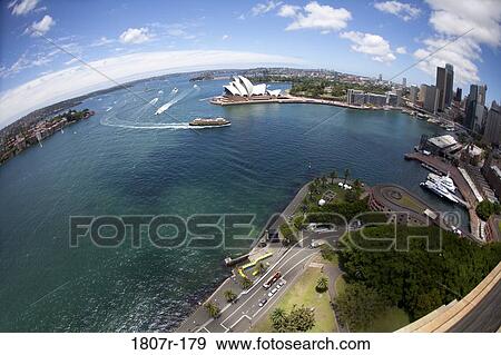 Aerial view of a harbor, Sydney Harbor, Sydney opera house, Sydney, New South Wales, Australia View Large Photo Image Stock Photo - Aerial view of a harbor, Sydney Harbor, Sydney opera house, Sydney, New South Wales, Australia. Fotosearch