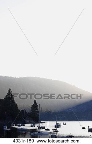 Stock Photo - Boats in a lake, Pinecrest Lake, Stanislaus National Forest, Tuolumne County, California, USA. Fotosearch