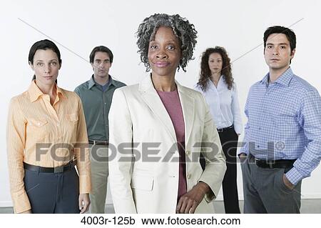 Businesswoman leading her team View Large Photo Image Stock Image - Businesswoman leading her team. Fotosearch