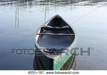 Stock Photo - Canoe in a lake, Pinecrest Lake, Stanislaus National Forest, Tuolumne County, California, USA. Fotosearch