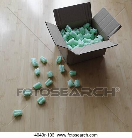 Cardboard box with packing peanuts View Large Photo Image Stock Image - Cardboard box with packing peanuts. Fotosearch