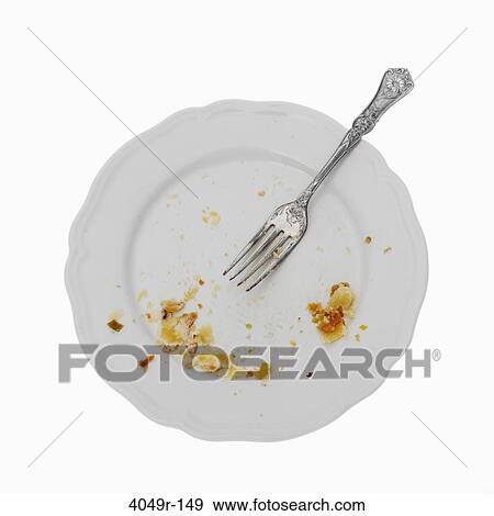 Stock Photo - Close-up of a dirty plate with a fork. Fotosearch