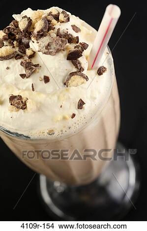 Close-up of a glass of milkshake View Large Photo Image Picture - Close-up of a glass of milkshake. Fotosearch