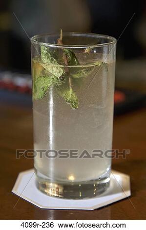 Close-up of a glass of Mojito View Large Photo Image Stock Photograph - Close-up of a glass of Mojito. Fotosearch
