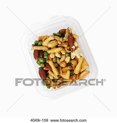 Stock Photo - Close-up of a platter of mixed nuts snack. Fotosearch