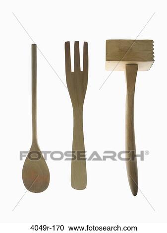 Close-up of a wooden spoon with a fork and a meat tenderizer View Large Photo Image Stock Image - Close-up of a wooden spoon with a fork and a meat tenderizer. Fotosearch