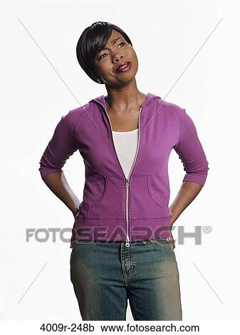 Close-up of a young woman day dreaming View Large Photo Image Stock Image - Close-up of a young woman day dreaming. Fotosearch
