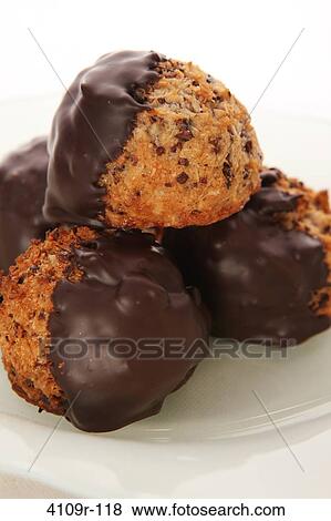Close-up of chocolate dipped macaroons View Large Photo Image Stock Photo - Close-up of chocolate dipped macaroons. Fotosearch