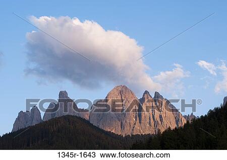 Clouds over mountain range, Geisler Gruppe, Funes Valley, Dolomites, Trentino-Alto-Adige, Italy View Large Photo Image Stock Image - Clouds over mountain range, Geisler Gruppe, Funes Valley, Dolomites, Trentino-Alto-Adige, Italy. Fotosearch