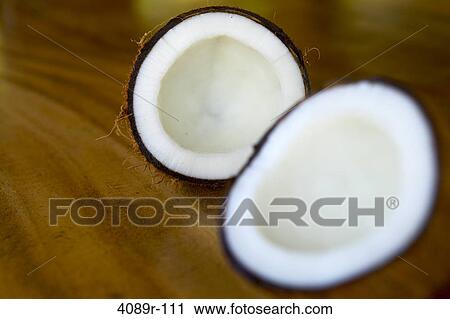 Coconut cut in half, Bora Bora, Society Islands, French Polynesia View Large Photo Image Stock Image - Coconut cut in half, Bora Bora, Society Islands, French Polynesia. Fotosearch