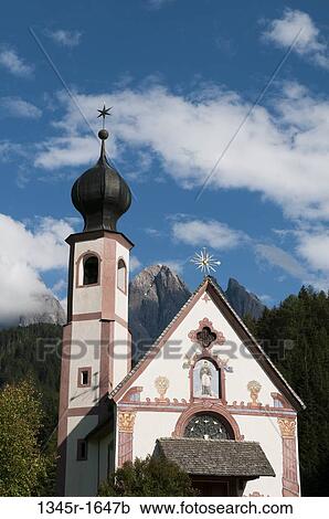 Facade of a church, St. Johann Church, Funes Valley, Dolomites, Trentino-Alto-Adige, Italy View Large Photo Image Stock Image - Facade of a church, St. Johann Church, Funes Valley, Dolomites, Trentino-Alto-Adige, Italy. Fotosearch