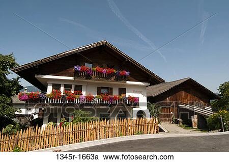 Facade of a hotel, Tiso, Funes Valley, Dolomites, Trentino-Alto-Adige, Italy View Large Photo Image Stock Image - Facade of a hotel, Tiso, Funes Valley, Dolomites, Trentino-Alto-Adige, Italy. Fotosearch