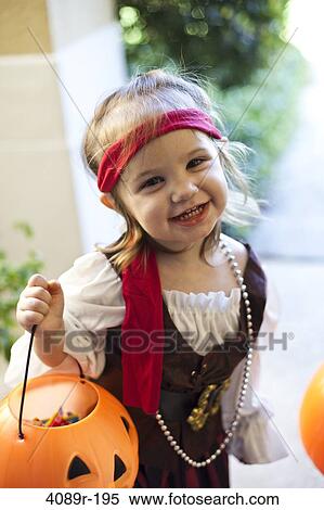 Girl playing Trick Or Treat View Large Photo Image Stock Photography - Girl playing Trick Or Treat. Fotosearch